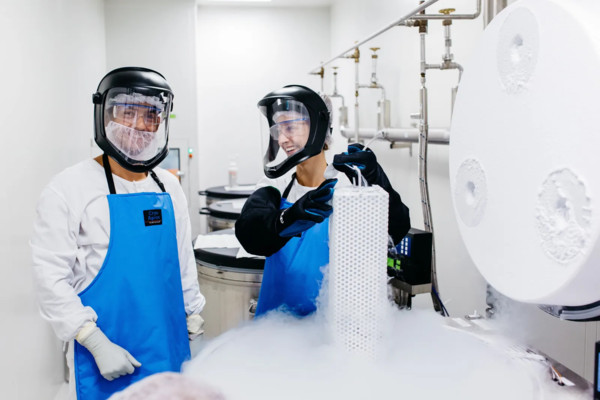 CEVA scientist smiling while working in a lab